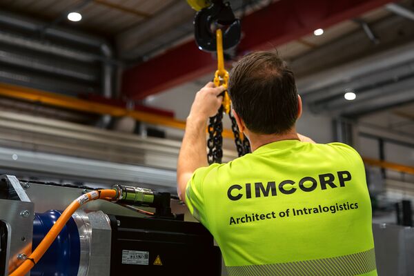 Cimcorp worker in automation integration